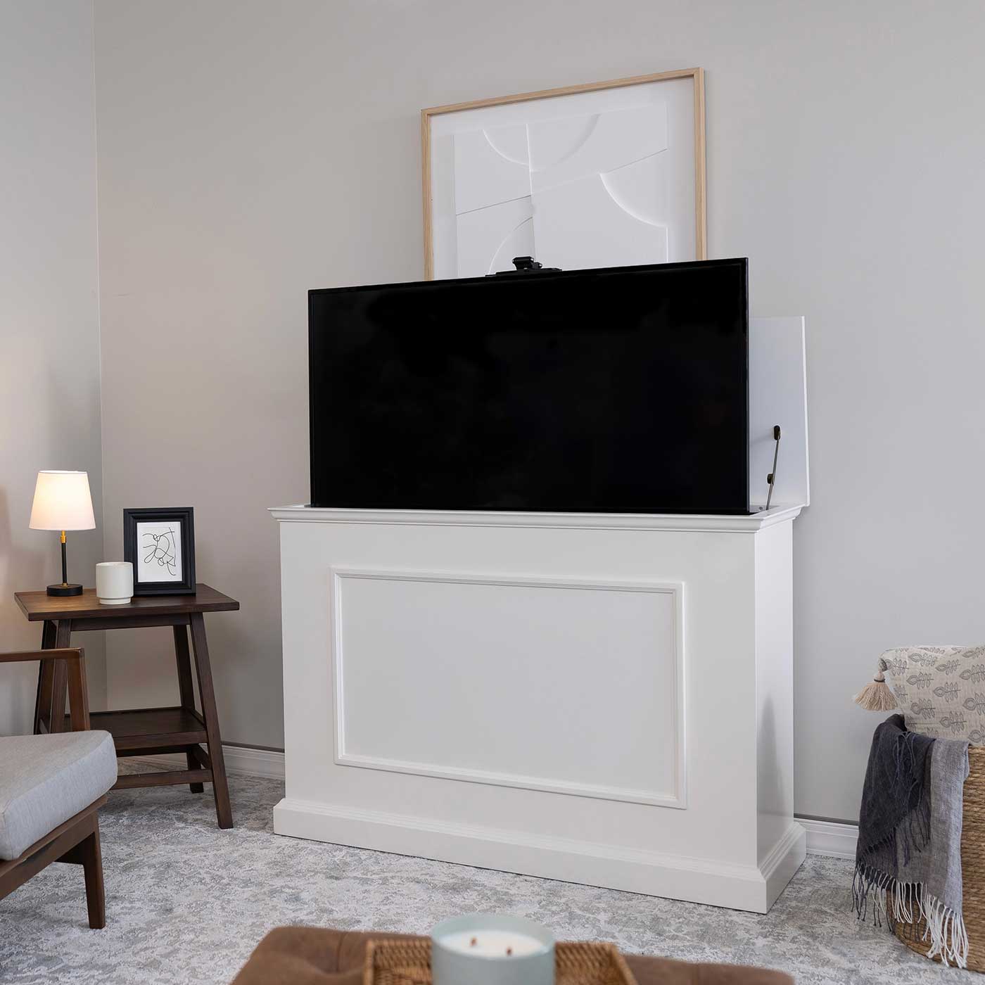 Touchstone Elevate 72015 TV Lift raises the hidden TV into view in the living room