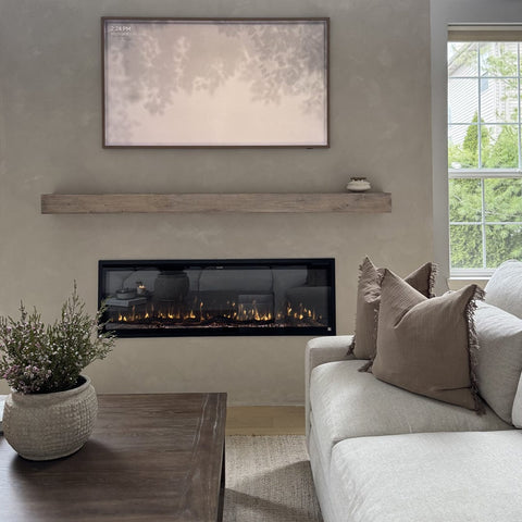 Touchstone Sideline Elite 60 Smart Electric Fireplace topped with an Encase Unfinished 84 inch Shelf Mantel, photo credit @bohoglamhaus