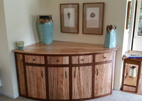 Custom built tv lift cabinet with doors featuring Touchstone Whisper Lift