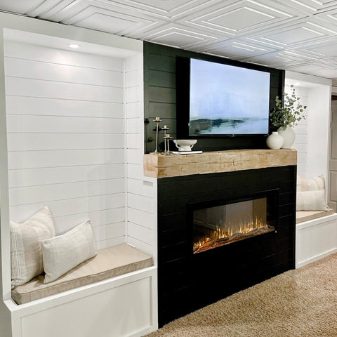 Touchstone Sideline Elite 50 Smart Electric Fireplace with benches on sides in black accent wall and wood mantel photo credit @farmtotablecreations
