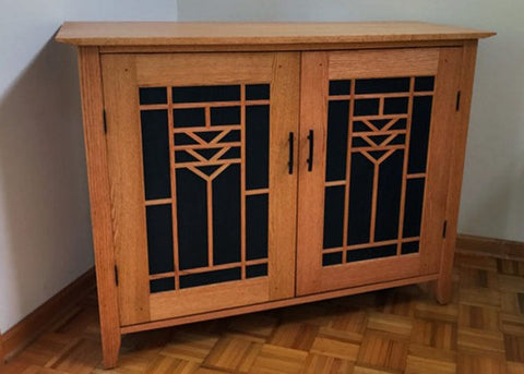 Whisper Lift TV Lift in the down position in Arts and Crafts custom built cabinet