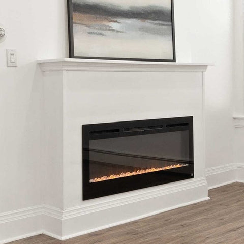 Minimalist white mantel with Touchstone Sideline Electric Fireplace by @kizzoandco