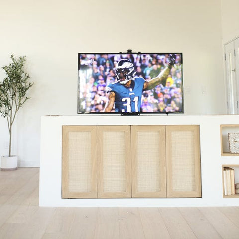 Whisper Lift Pro Advanced TV lift mechanism in a half room wall by @sachilord