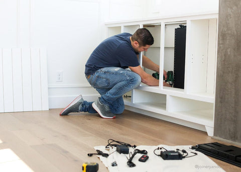 @joineryanddesignco installs a Touchstone Whisper Lift TV Lift Mechanism in a custom cabinet
