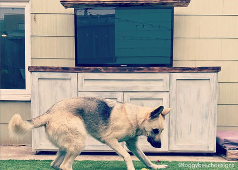 Reclaimed wood outdoor TV lift cabinet featuring Touchstone Whisper Lift II Pro TV Lift