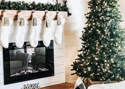 Touchstone Sideline Fireplace with Christmas tree and stockings