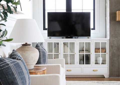 The finished custom cabinet by @joineryanddesignco featuring the Touchstone TV Lift