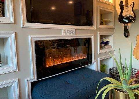 Touchstone Onyx Electric Fireplace recessed into wall