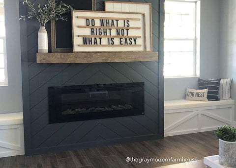 Sideline Electric Fireplace surrounded by dark gray shiplap