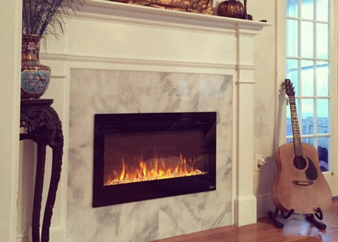 Touchstone Sideline 50 recessed in marble fireplace
