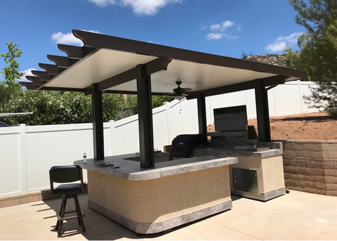 Outdoor entertainment area with Touchstone TV lift mechanism