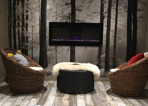 Sideline 50 Electric Fireplace with multi color flames and crystals in yoga studio
