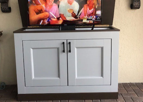 Jon Peters-inspired TV lift cabinet with a Touchstone TV Lift