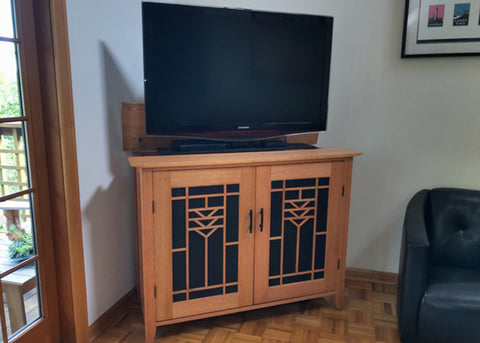Whisper Lift TV Lift in a custom built arts and crafts style cabinet