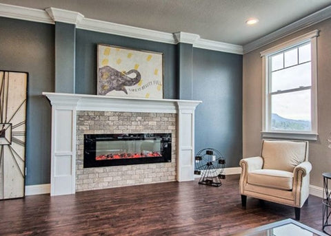 Touchstone Sideline Electric Fireplace with brick and white mantel