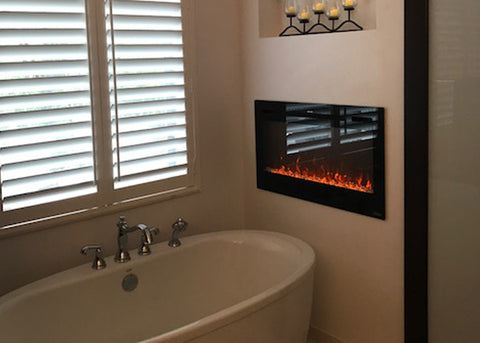 Touchstone Sideline 36 Electric Fireplace in the bathroom