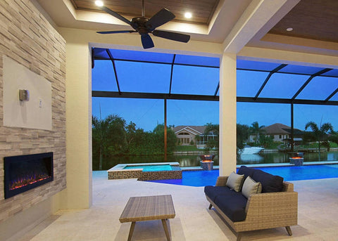 Sideline Outdoor Electric Fireplace at dusk