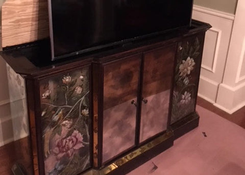 Whisper Lift TV Lift mechanism mounted in a console cabinet.