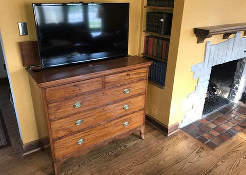 SlimLift Pro TV Lift in an antique dresser.