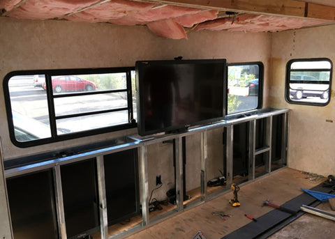 Whisper Lift TV lift built into a TV production trailer
