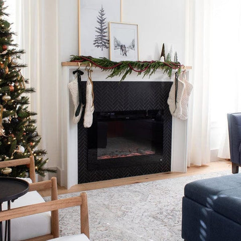 Touchstone Forte Electric Fireplace with black surround on white wall, @with.love.mercedes