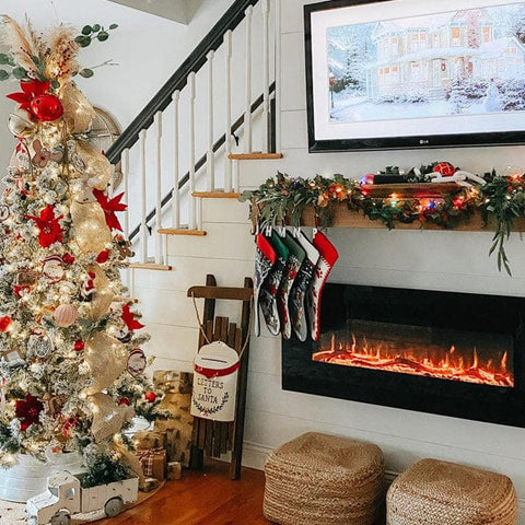 Touchstone Onyx Wall Mount Electric Fireplace decorated for Christmas by @interiorswag