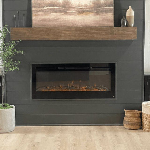 Touchstone Sideline 50 inch electric fireplace inserted in a black shiplap wall in finished basement. Photo credit @homeonnativetrail