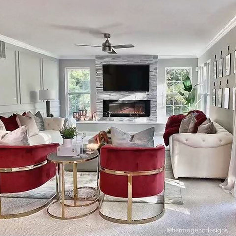Touchstone Sideline Electric Fireplace in glam room with gold and red tones by 7luxessentials