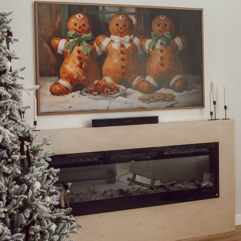 Touchstone Sideline 72 Smart Electric Fireplace decorated for Christmas, photo credit @therapybyemily_