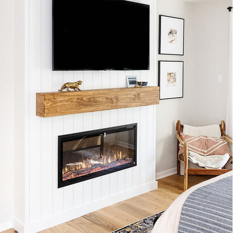 Touchstone Sideline Elite Smart Electric Fireplace in bedroom with shiplap accent wall by @sipdinedesign