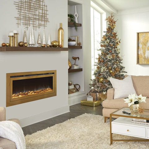 Touchstone Sideline Deluxe Gold Smart Electric Fireplace with gold holiday decor and Christmas tree