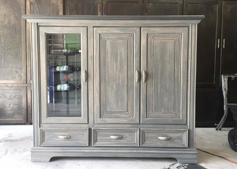 Hidden TV lift combined with a wine fridge
