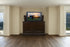 Grand Elevate 74008 Espresso TV Lift Cabinet for 65 inch Flat screen TVs pictured in a room setting.