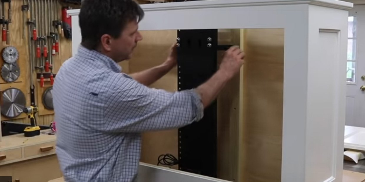 Woodworker Jon Peters adds a Whisper Lift TV lift mechanism to his custom built pop up TV cabinet