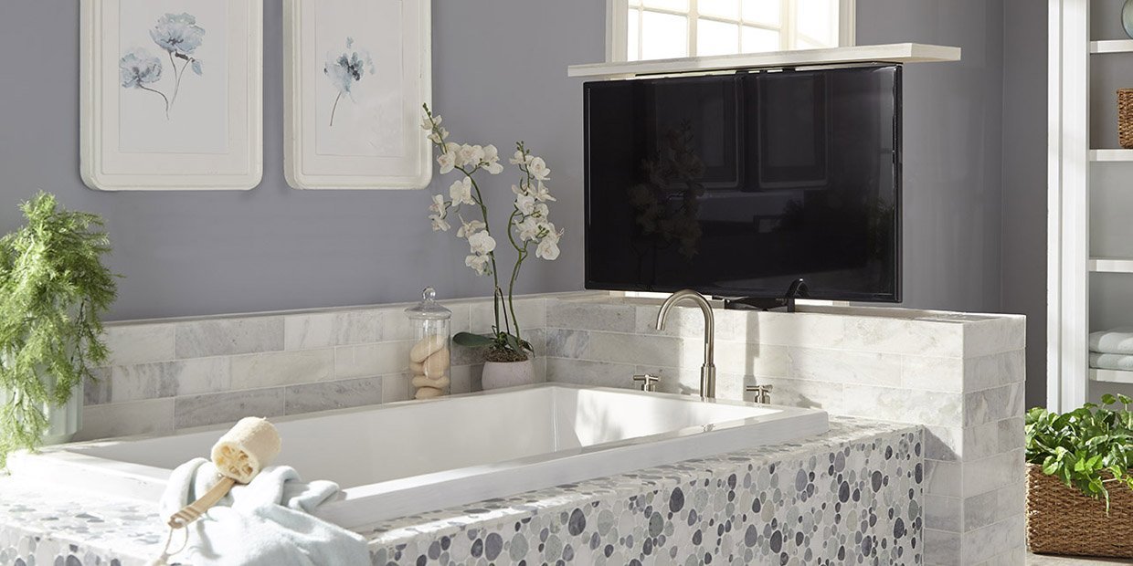 Touchstone Home Products versatile TV lift technology in the bathroom