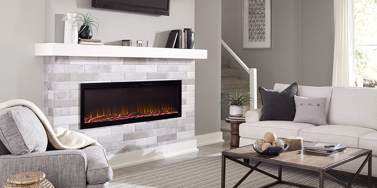 The realistic flames of a Touchstone Sideline Smart Electric Fireplace look like a gas fireplace