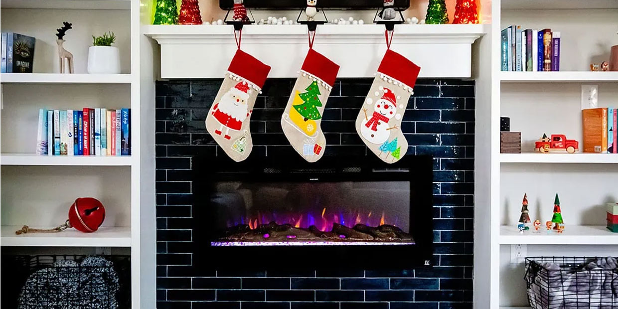 Touchstone Sideline 45 Smart Electric Fireplace in a black tile accent wall is named a top Christmas gift by Daily Mon