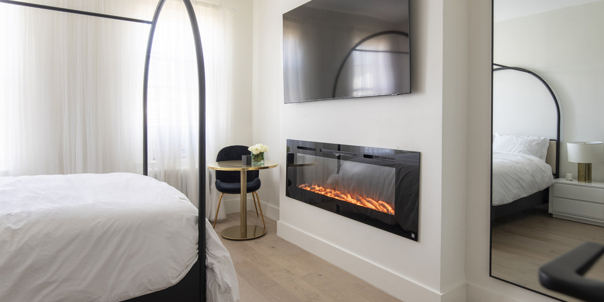 Touchstone Sideline 60 Electric Fireplace recessed in accent wall  in master bedroom designed by Victoria Lee Jones
