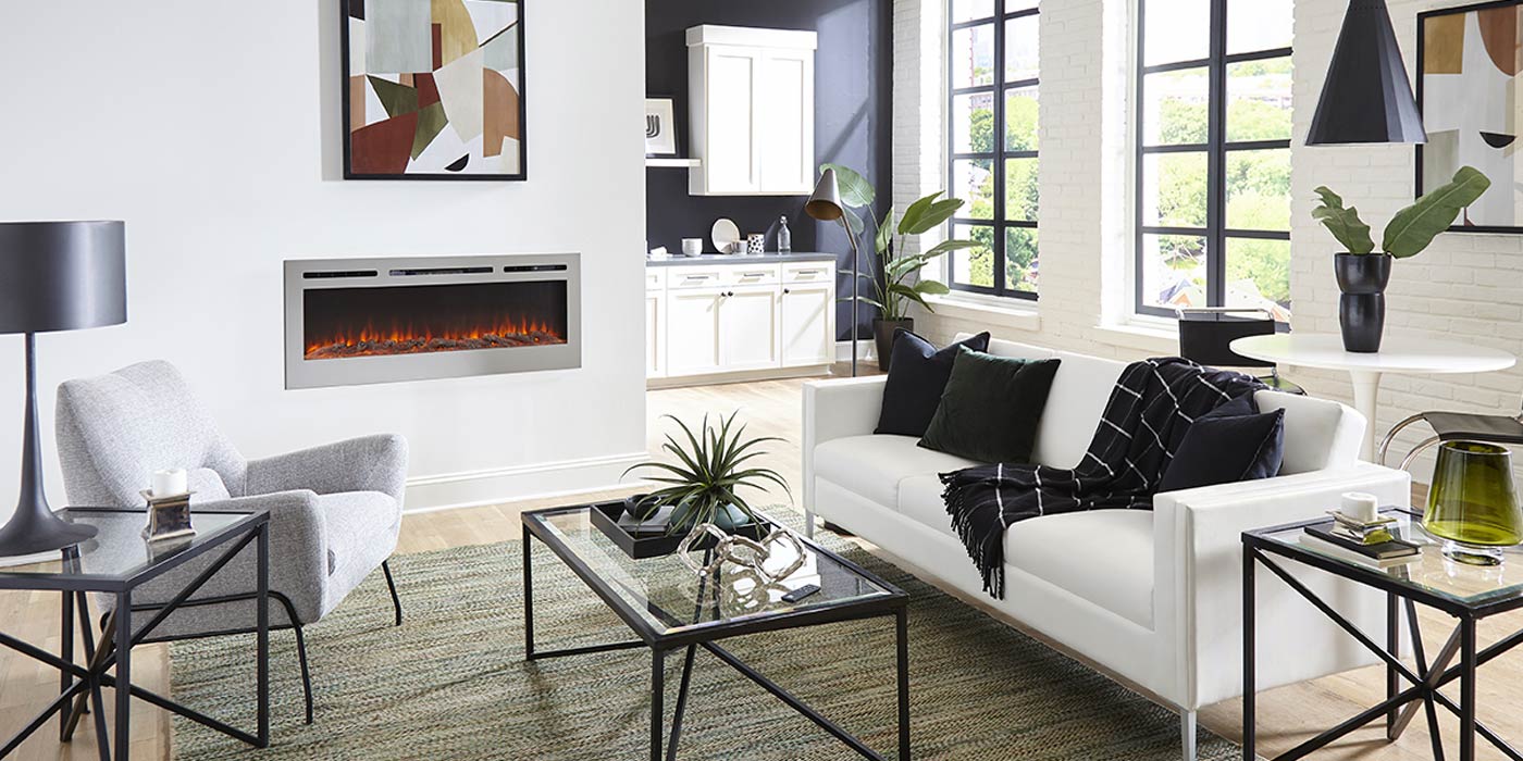 Touchstone Sideline Deluxe Stainless Electric Fireplace in a modern open plan apartment