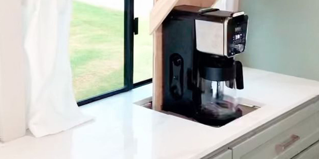 Multifunctional Touchstone TV lift motorized mechanism hides a coffeemaker in a skoolie converted motor home by @highwayhoosiers