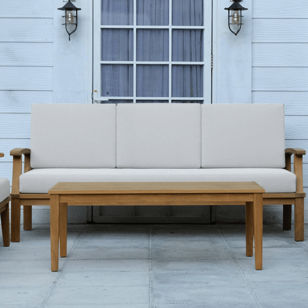 Touchstone Solena Teak Sofa coffee table lifestyle photo