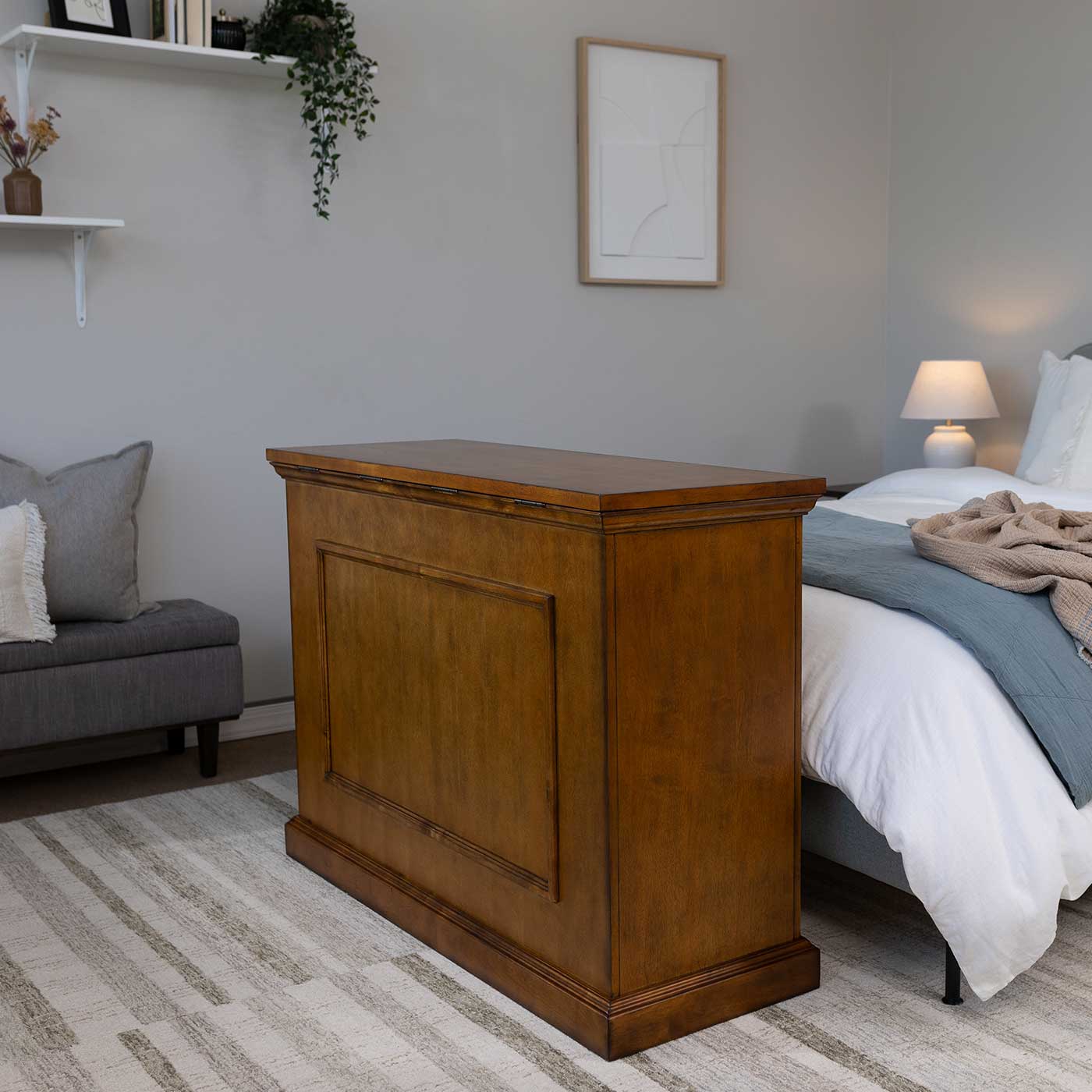 Touchstone Elevate 72009 TV Lift pictured in a bedroom with the cabinet closed.