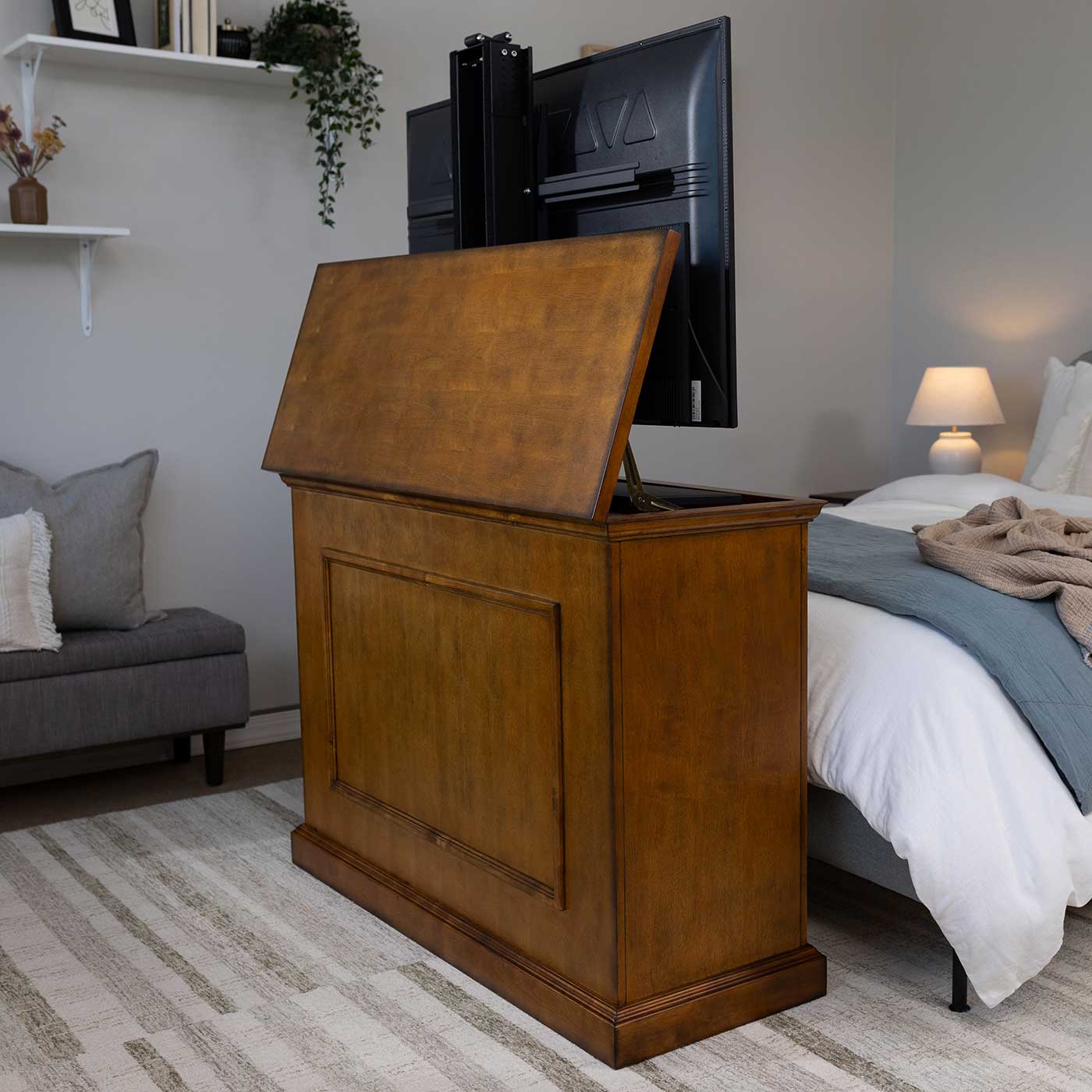 Touchstone Elevate 72009 TV Lift pictured in a bedroom with the cabinet opened fully.