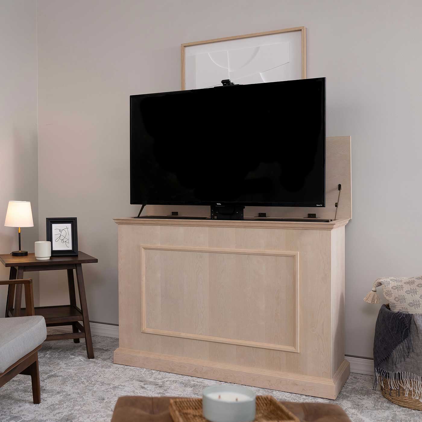 Touchstone Elevate 72012 TV Lift pictured in a living room with the cabinet opened fully.  