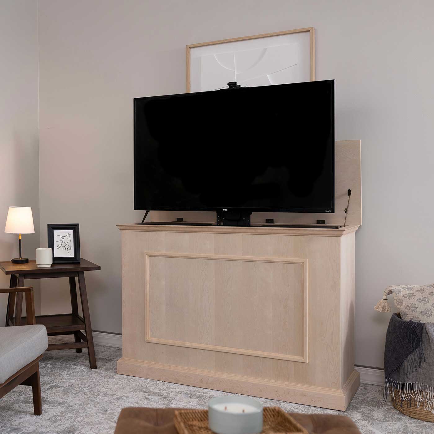 Touchstone Elevate 72012 TV Lift pictured in a living room with the cabinet opened fully.