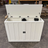 Touchstone 72013 White Elevate Mission Smart TV Lift Cabinet open box unit photographed in the warehouse.