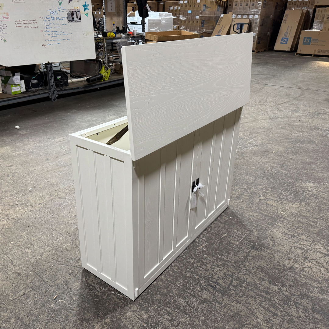 Touchstone 72013 White Elevate Mission Smart TV Lift Cabinet open box unit photographed in the warehouse.