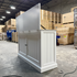 Touchstone Large Shoreline Smart TV Lift Cabinet 74010 in White - open box model photographed in the warehouse.