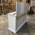Touchstone Large Shoreline Smart TV Lift Cabinet 74010 in White - open box model photographed in the warehouse.