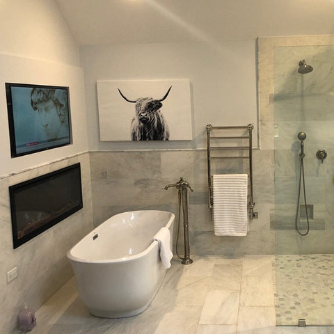 Touchstone Sideline Elite Smart Electric Fireplace in bathroom by customer